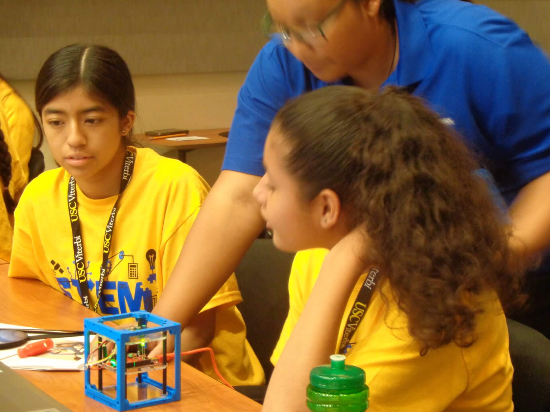 Northrop Grumman engineering helping students program Arduino using a CubeSat. 