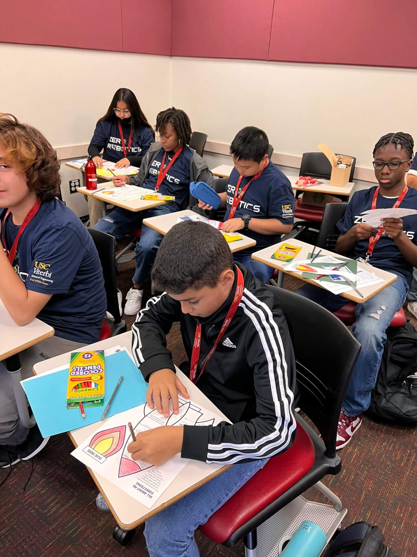 Children building robots